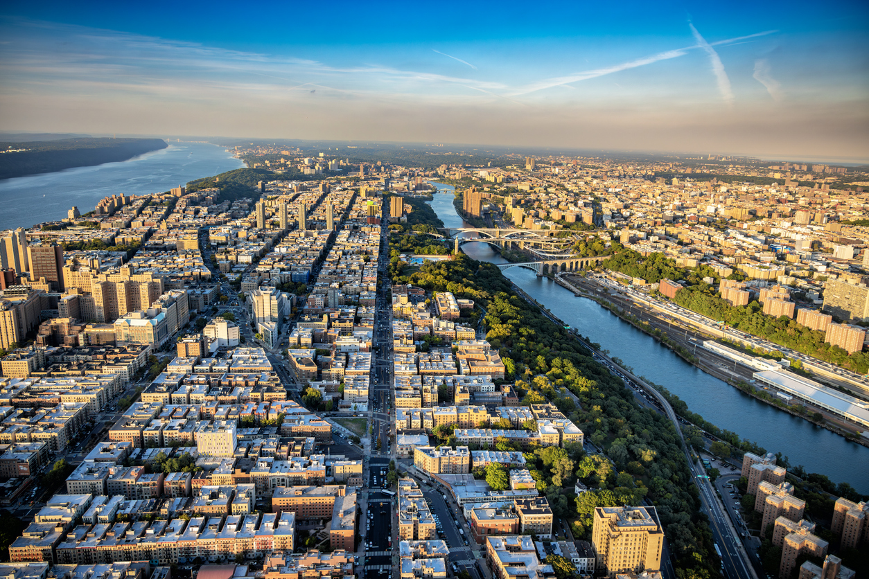 Inwood Manhattan The northern portion of Manhattan Island, New York City including the neighborhoods of Harlem, Washington Heights, and Inwood bordered between the Hudson and Harlem Rivers. The western portion of the Bronx in view as well. This was shot via helicopter from an altitude of about 1200 feet over the city.