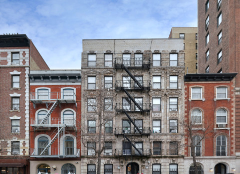 New York City old fashioned apartment buildings with external fire ladders