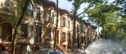 Open fire hydrant on a typical block of residential Ridgewood.jpg image