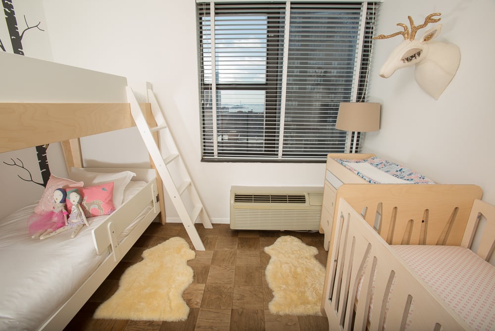 bed and crib in one room