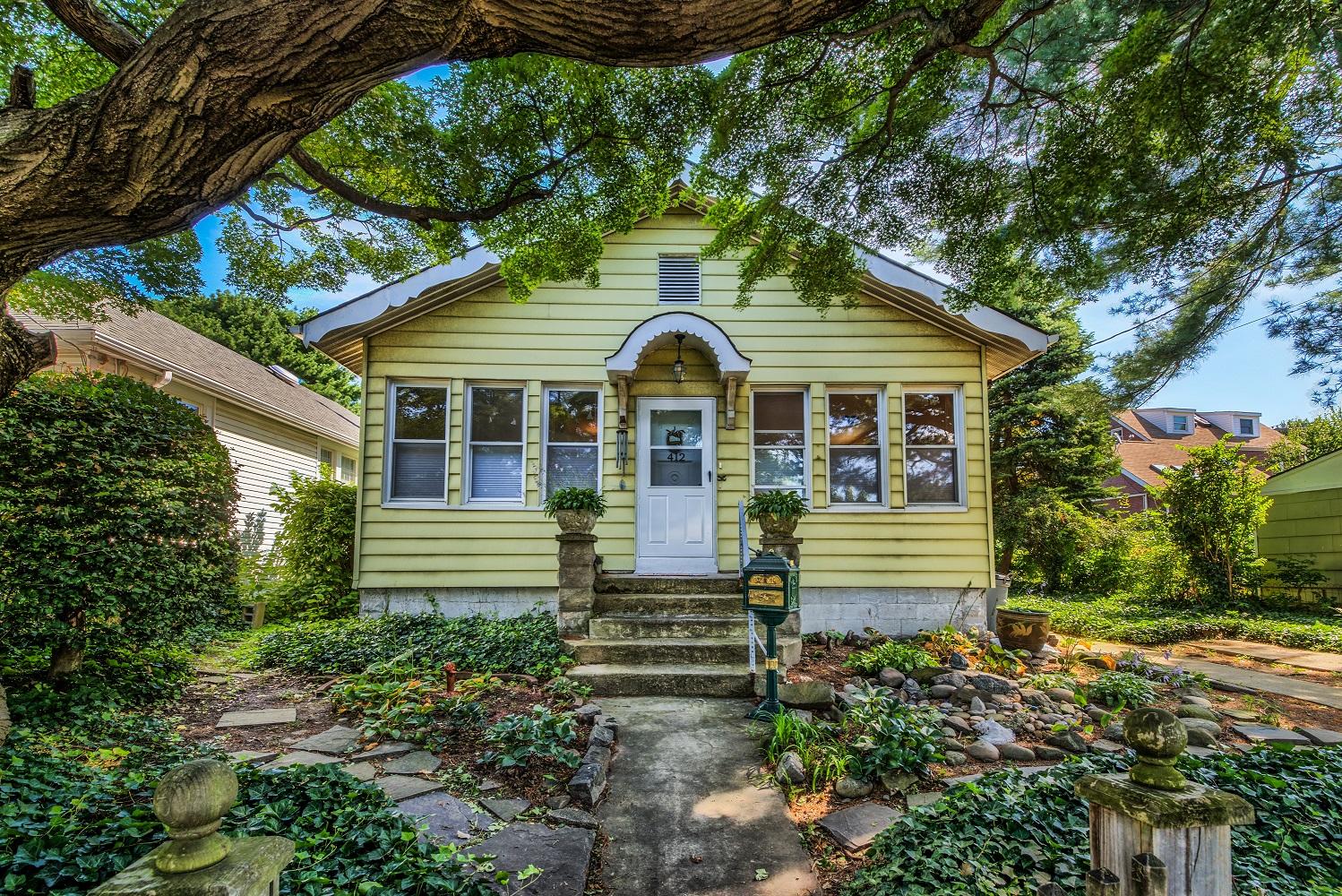 Buy this cute house on City Island for a little less than $500,000