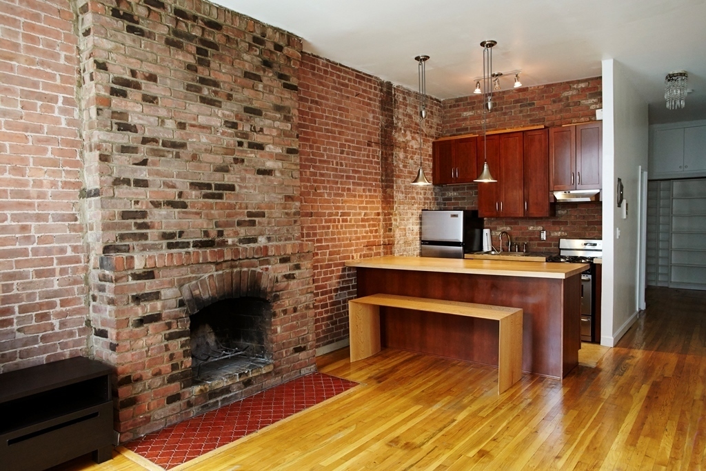 A Hell's Kitchen studio that almost qualifies as a one-bedroom? Yes, please