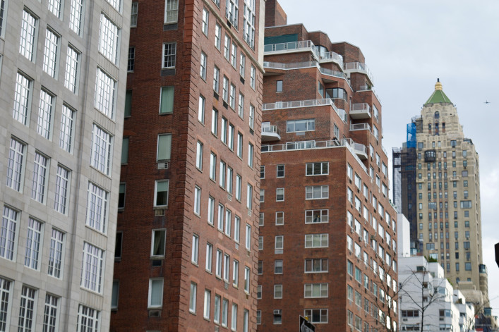 A row of NYC apartment buildings