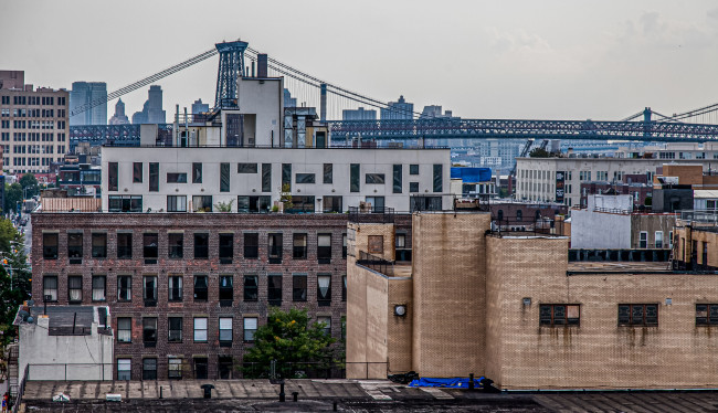 Spectacular views from the rooftop bar of the Wythe Hotel in the heart of Williamsburg, a neighborhood in Brooklyn in New York City.