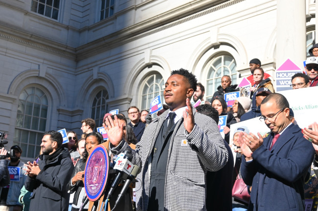 Chi Ossé on the steps of the New York City Council ahead of an afternoon vote on his FARE Act.