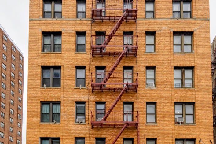 New-York building facades with fire escape stairs