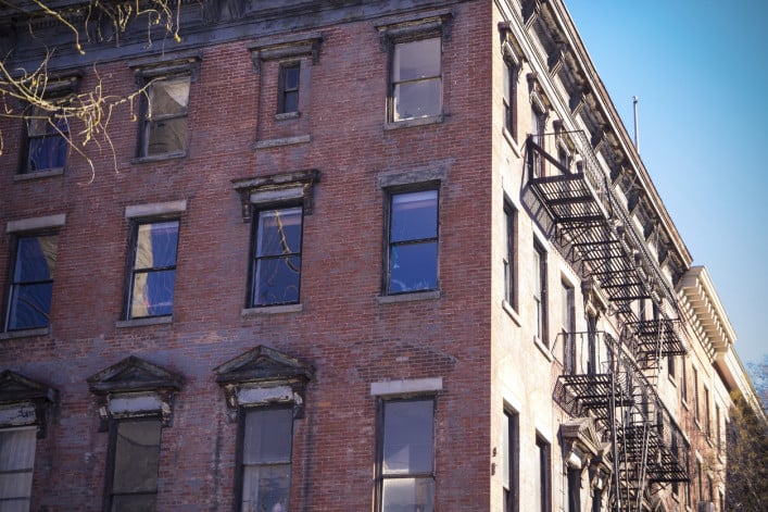 A red brick Brooklyn multifamily apartment building