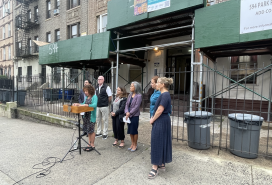 Deputy Mayor for Operations Meera Joshi announces the GreenHOUSE fund to a small crowd of reporters and advocates on Thursday, Sept. 26th.