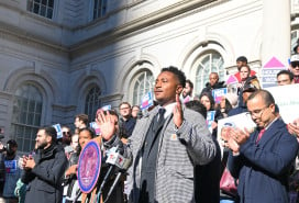 Chi Ossé on the steps of the New York City Council ahead of an afternoon vote on his FARE Act.