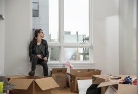 Woman moving into a Brooklyn sublet