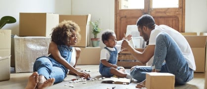 Morsa Images via Getty .jpg family moves into NYC apartment
