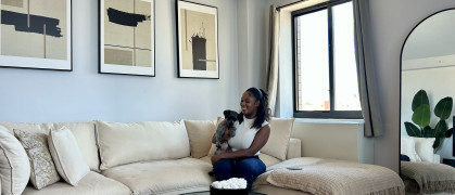 A photo of Kayla on her couch in the Bronx.