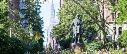 Gramercy Park in Manhattan, NYC with Midtown skyscrapers in the background