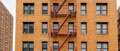 New-York building facades with fire escape stairs