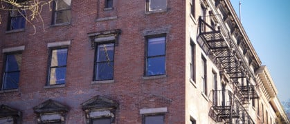 A red brick Brooklyn multifamily apartment building